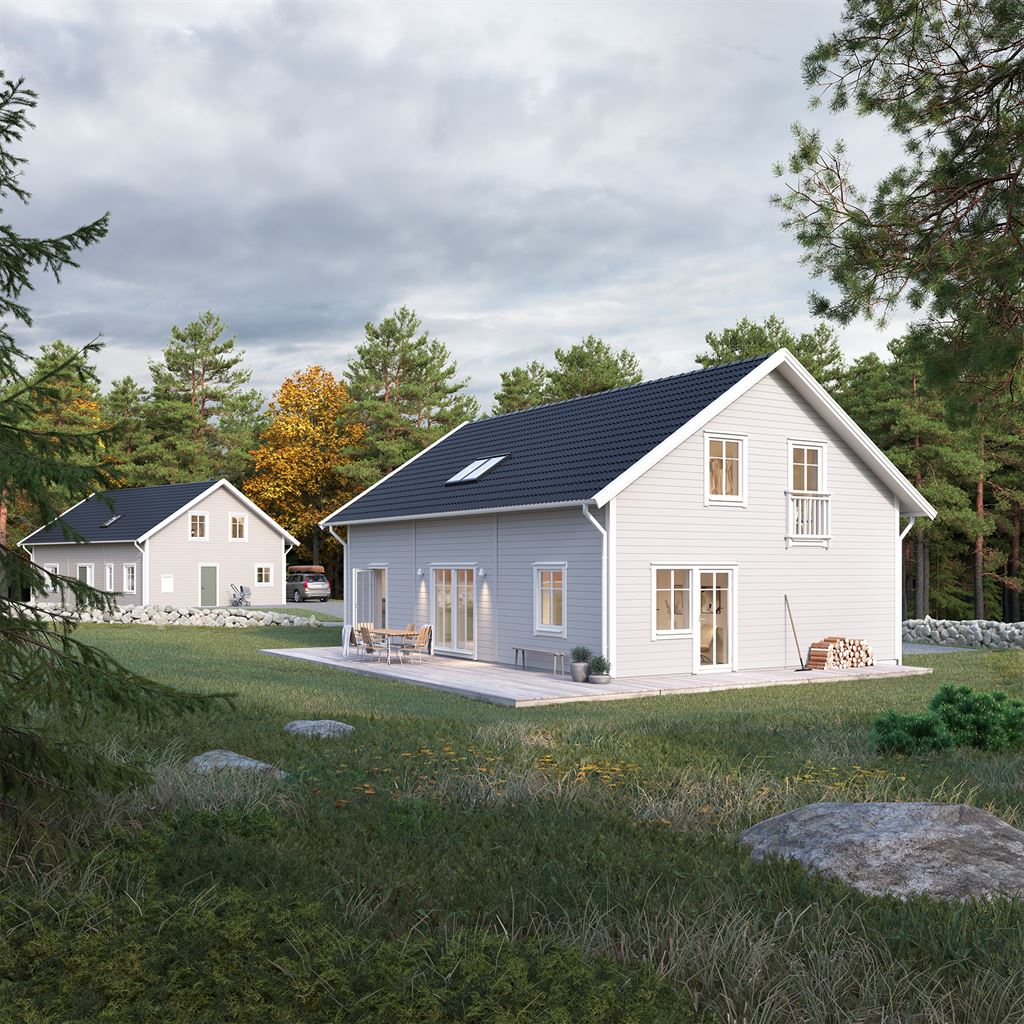 Grått Villa Björkösund exteriör i klassisk stil i skog